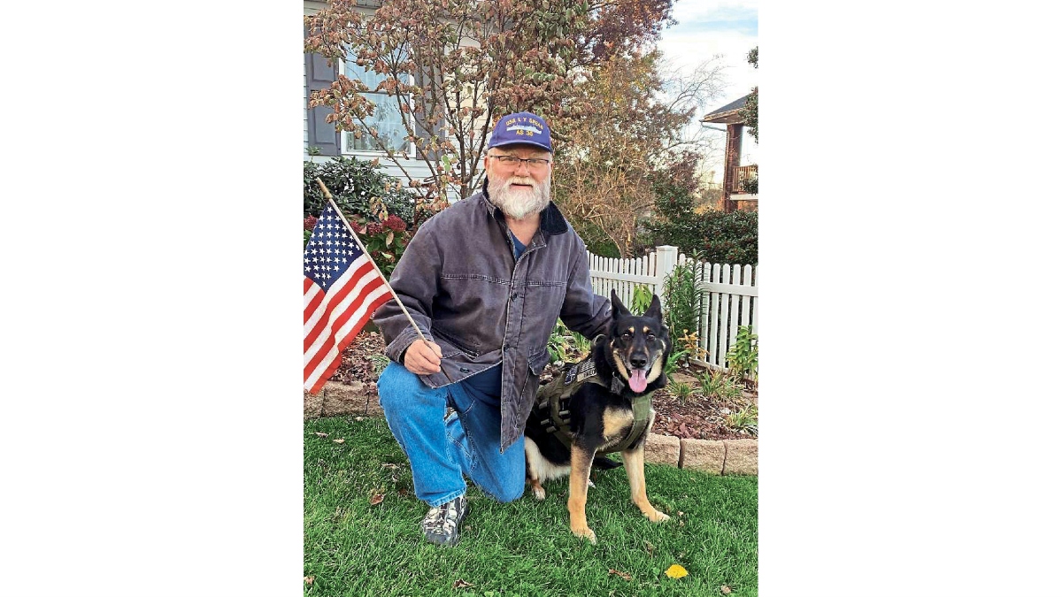 Mike Brecht and his veteran canine, Beky