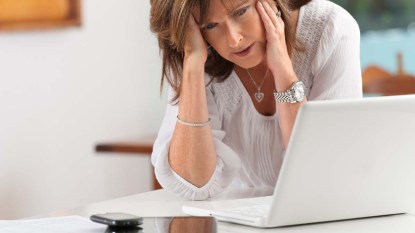 Woman getting tired of her digital devices