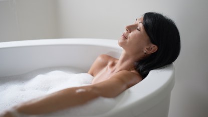 Woman relaxing and taking a bathWoman relaxing and taking a bath