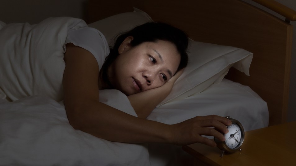 woman waking up in the middle of the night