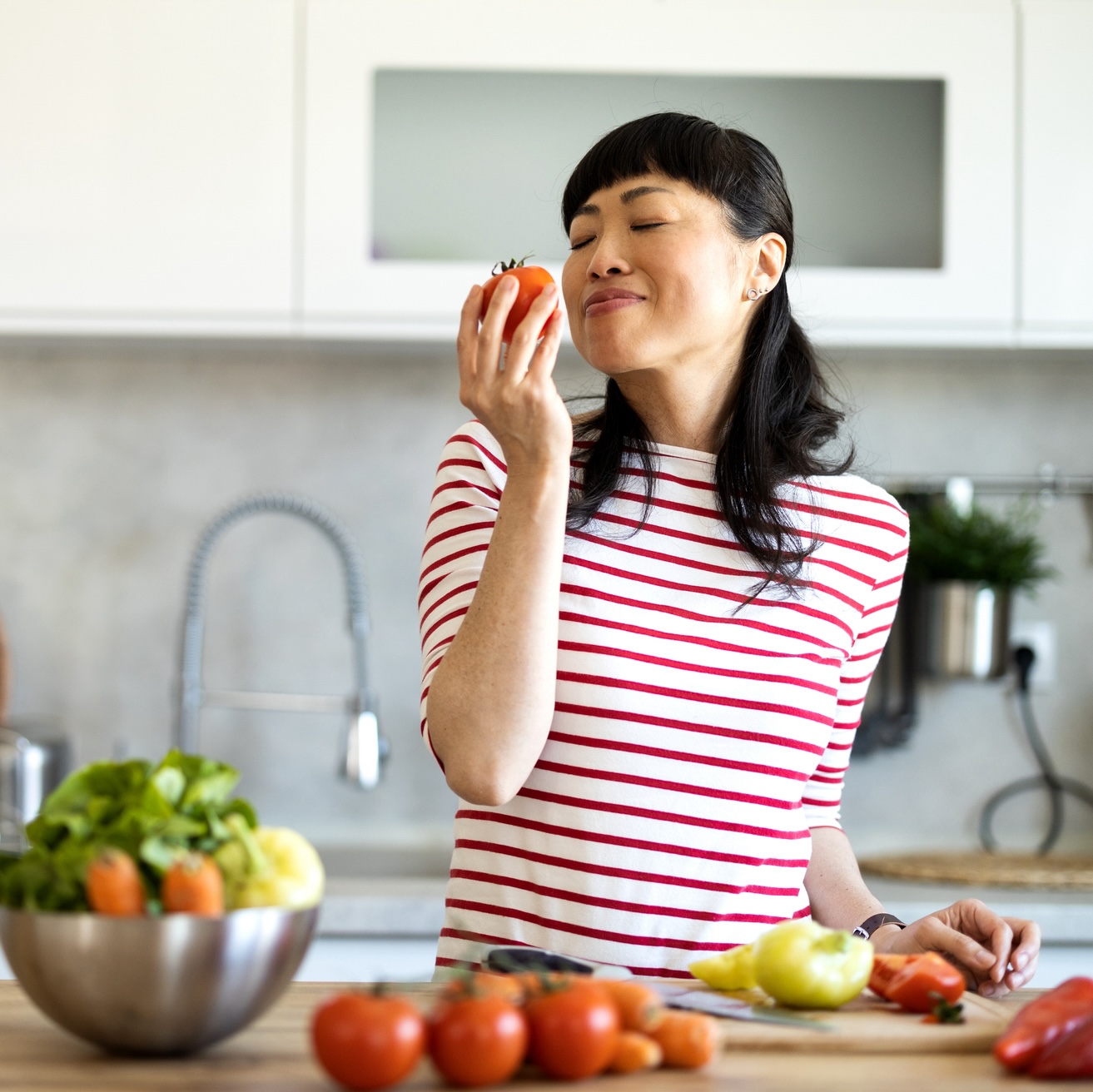 mature woman eating healthy after wondering 'why am i not losing weight'