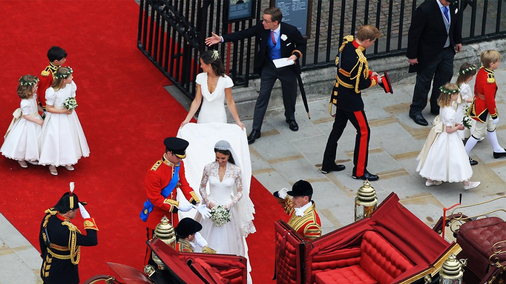 The couple getting ready to take a ride in the royal carriage