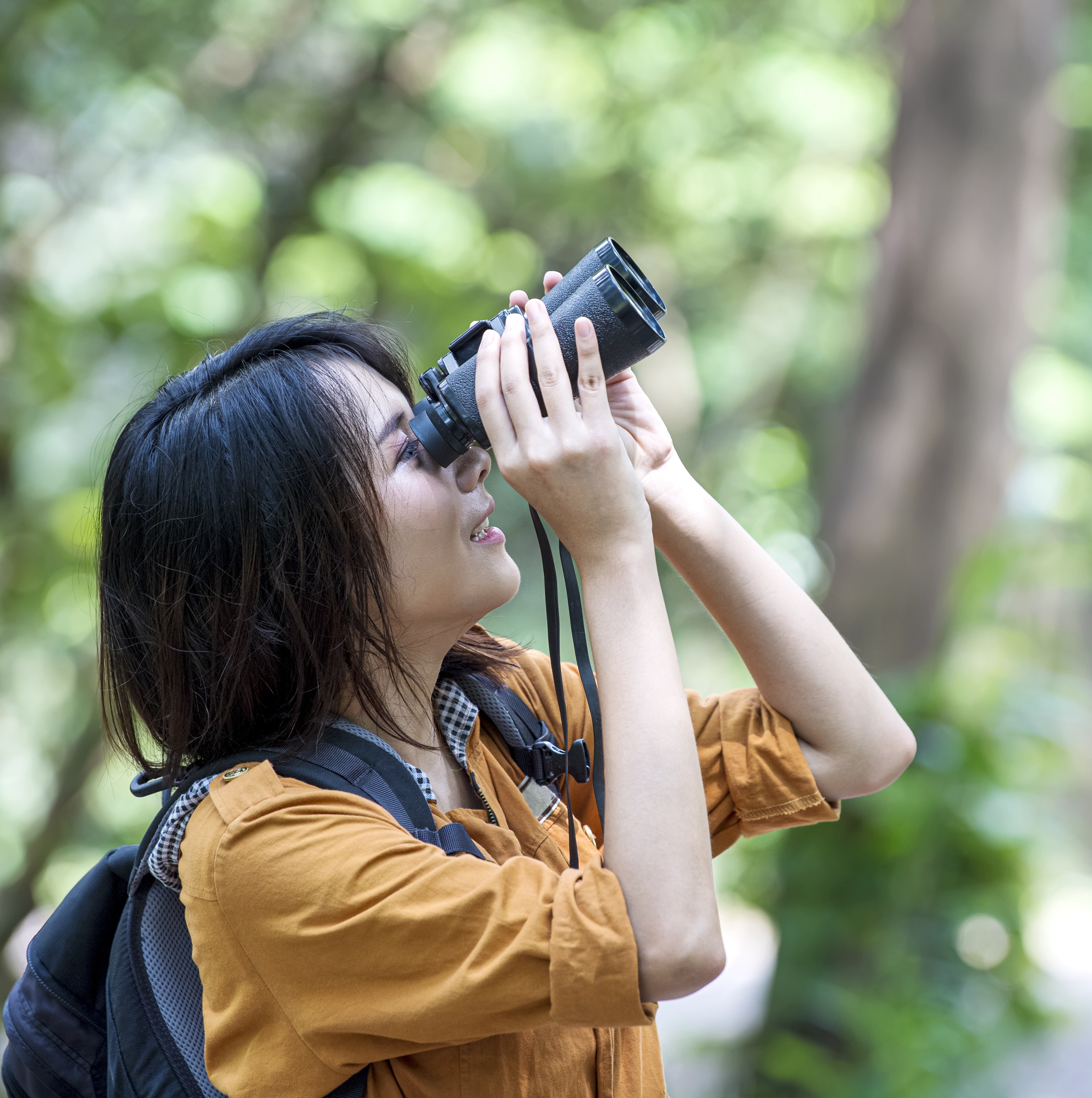 Woman looking for birds