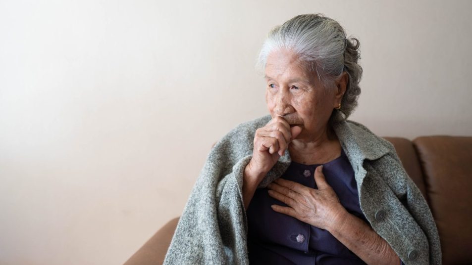 senior woman with a cough and chest pain, mold in your home concept