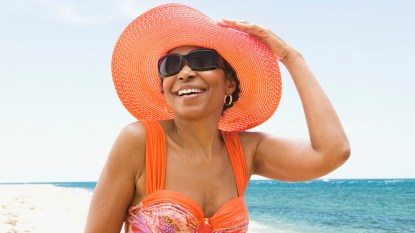 Woman enjoying herself at the beach