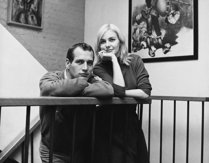 Portrait of married American actors Paul Newman and Joanne Woodward at home.