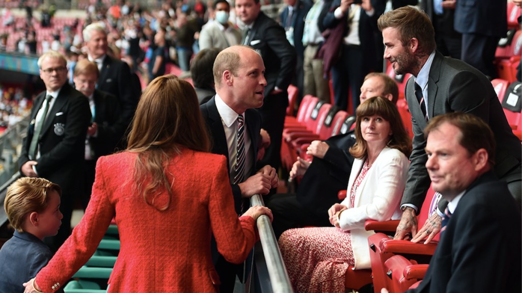 Prince William speaking to David Beckham