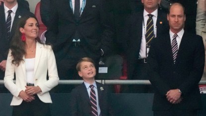 William, Kate, and George at a soccer match