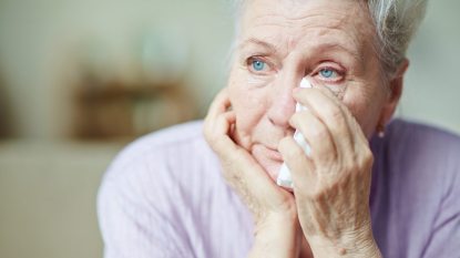 senior woman crying, concept for ageism affecting health