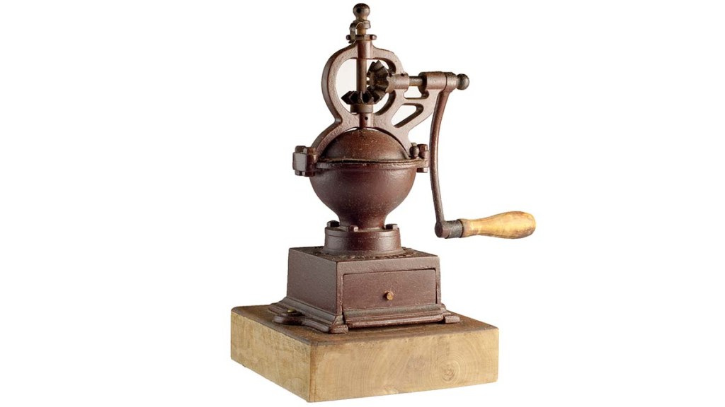An-antique-coffee-grinder-on-a-pedestal