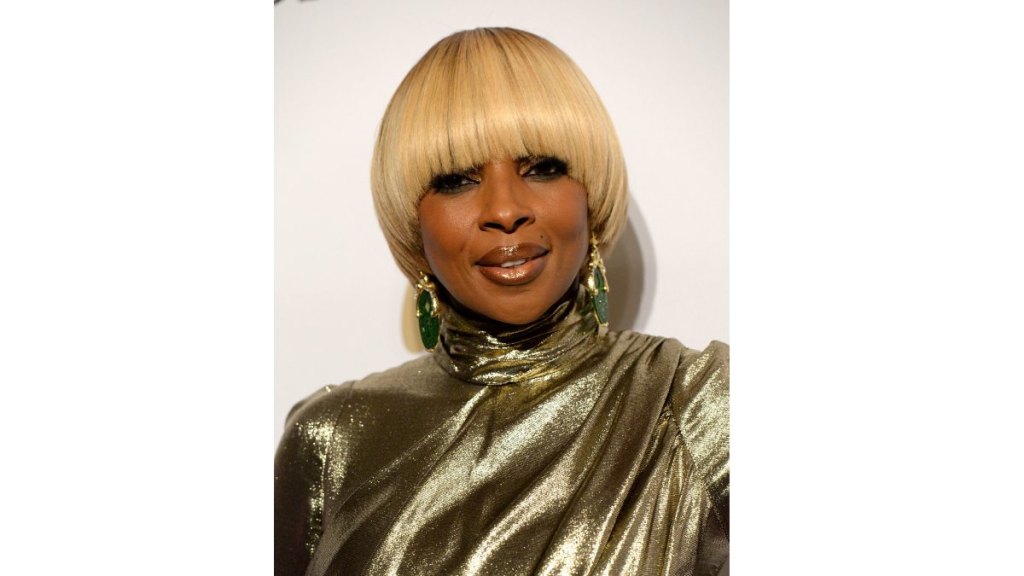 Mary J Blige with a blonde bowl cut