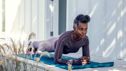 Mature-woman-doing-a-plank-exercise-as-part-of-a-pilates-routine