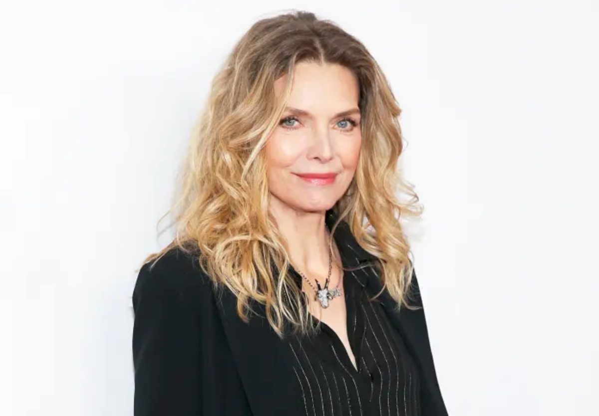 Michelle Pfeiffer with a layered cut with a middle part
