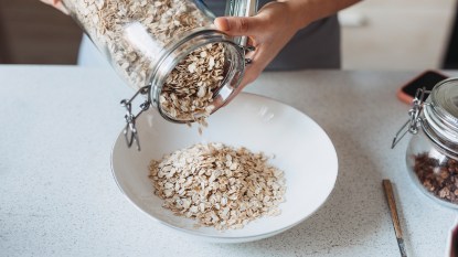 Oats being poured in a bowl