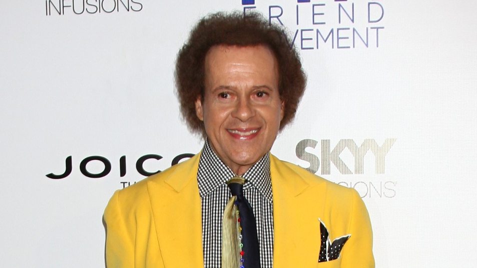 Richard Simmons in 2013 wearing a yellow jacket