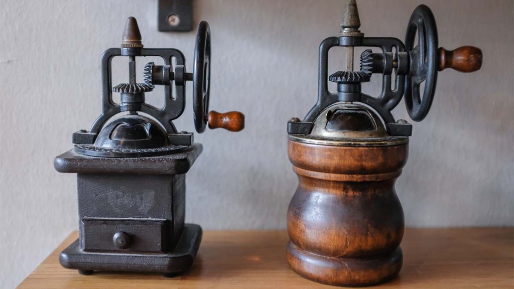 Two-single-wheel-antique-coffee-grinders
