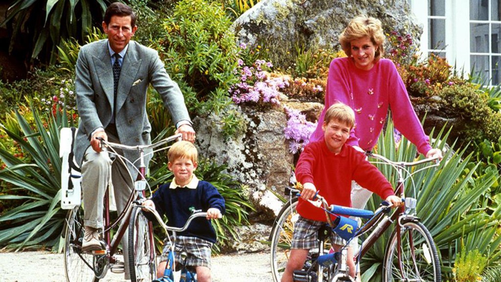 William and Harry as children, visiting the island of Tresco with their parents Prince Charles and Princess Diana.jpg
