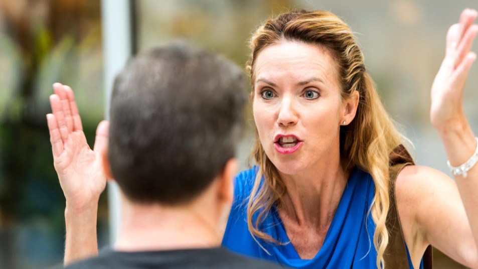 mature woman in a rage, arguing with a man
