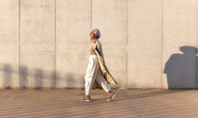 Senior woman walking outside