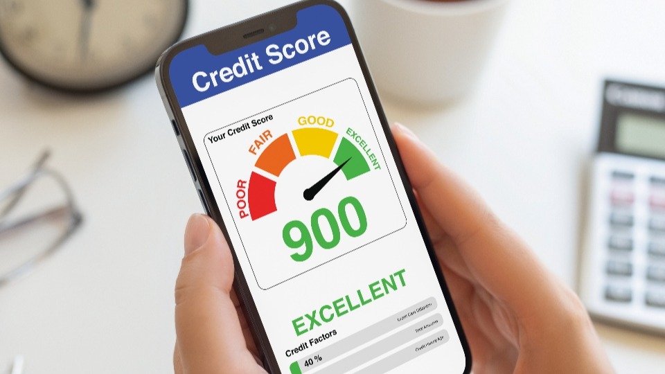 A phone showing a credit score