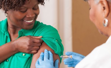 Woman getting her flu shot