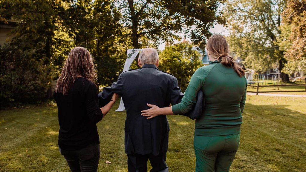 Frankie King walking toward the altar