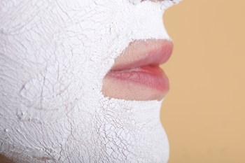 Mature woman with facial beauty mask