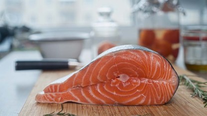 Salmon on cutting board
