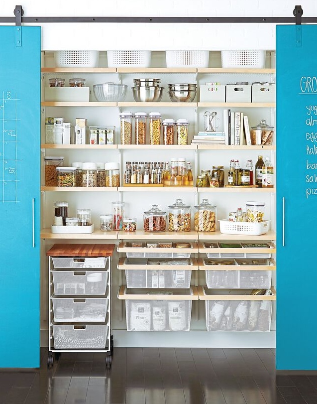 organized pantry with shelves, storage bins, and storage containers
