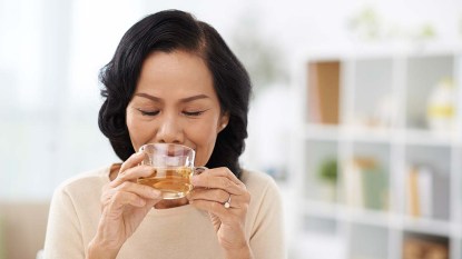 Woman drinking tea or an herbal infusion.jpg