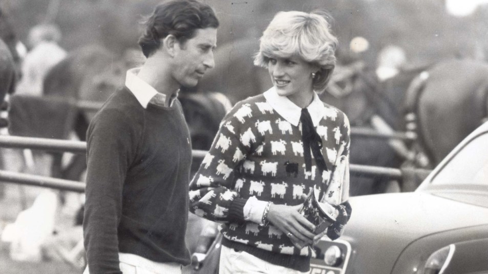 Princess Diana wearing her black sheep sweater with Prince Charles