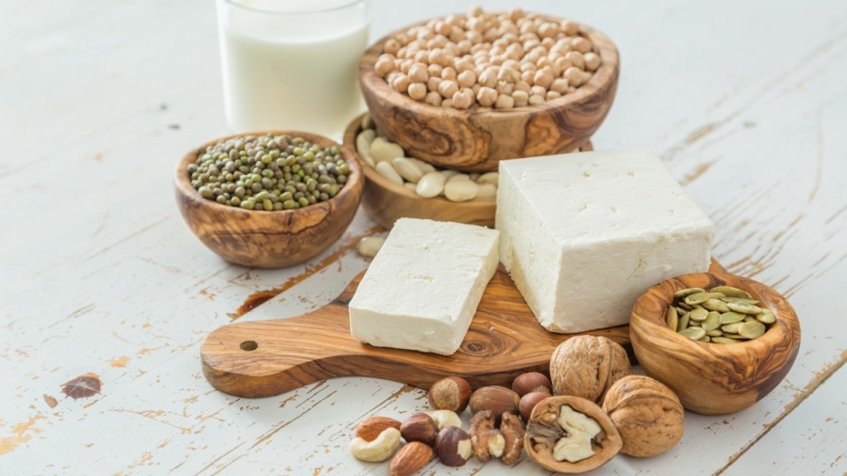 vegan protein sources, including tofu, walnuts, nuts, seeds, peas