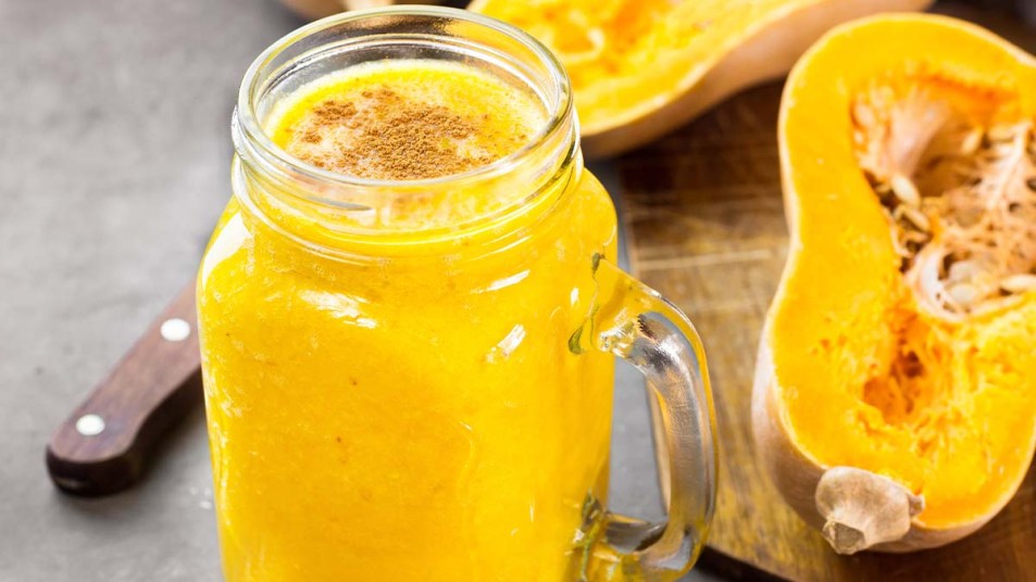 A butternut squash smoothie in a glass
