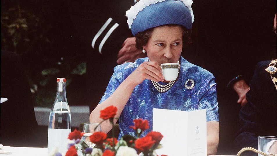 Queen Elizabeth sipping tea