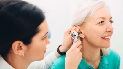 Woman getting her hearing checked