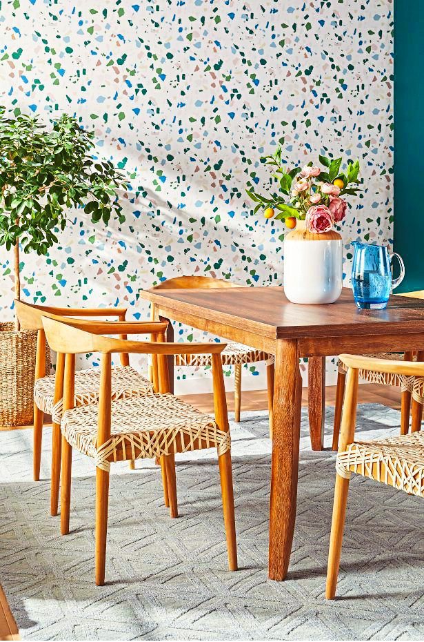 Dining area with terrazzo wallpaper from Overstock