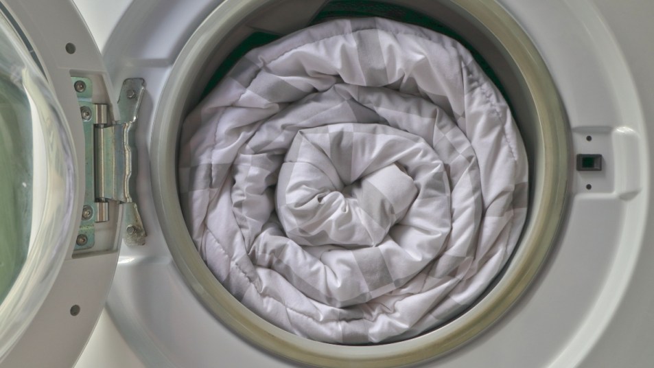 weighted blanket, gray inside of a washing machine