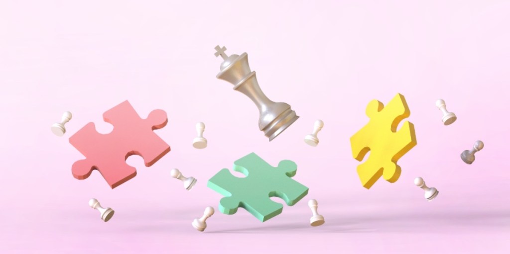 A pink background with colorful puzzle pieces and chess pieces, which can strengthen memory