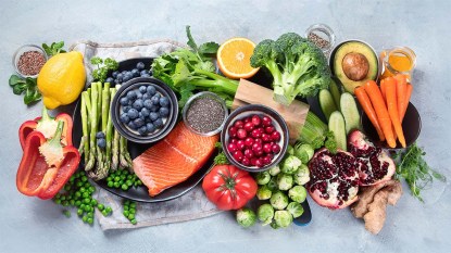 Healthy food selection on gray background
