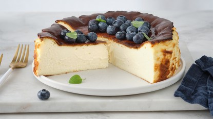 Basque cheesecake topped with blueberries