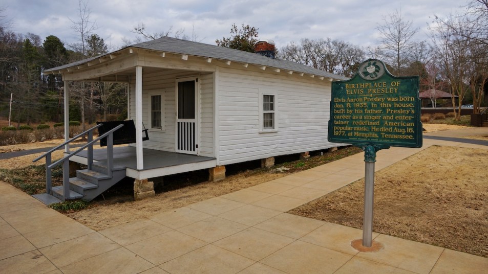 Exterior of Elvis Presley birthplace in Tupelo with historical plaque