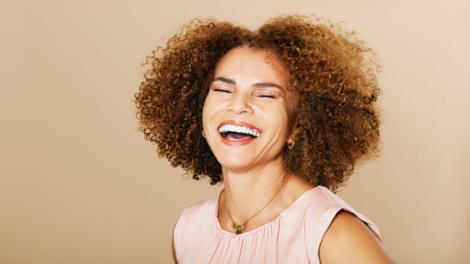 Middle aged woman laughing
