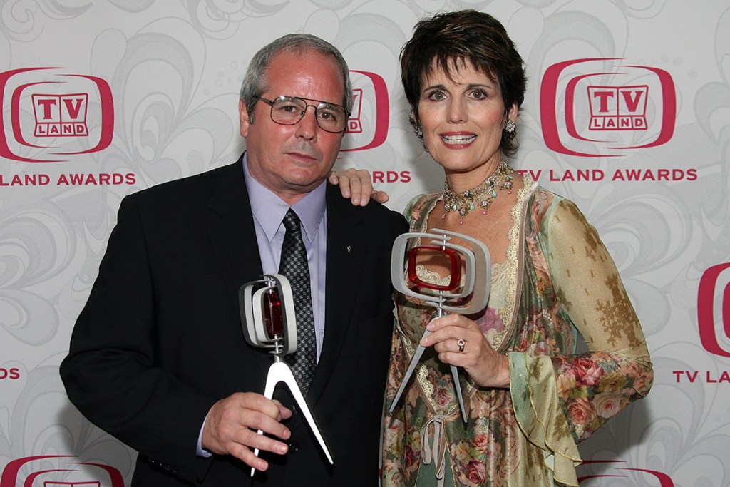 Desi Arnaz Jr. and Lucie Arnaz pose with the Legacy of Laughter Award for their mother, the late Lucille Ball backstage at the 5th Annual TV Land Awards held at Barker Hangar on April 14, 2007 in Santa Monica, California. 