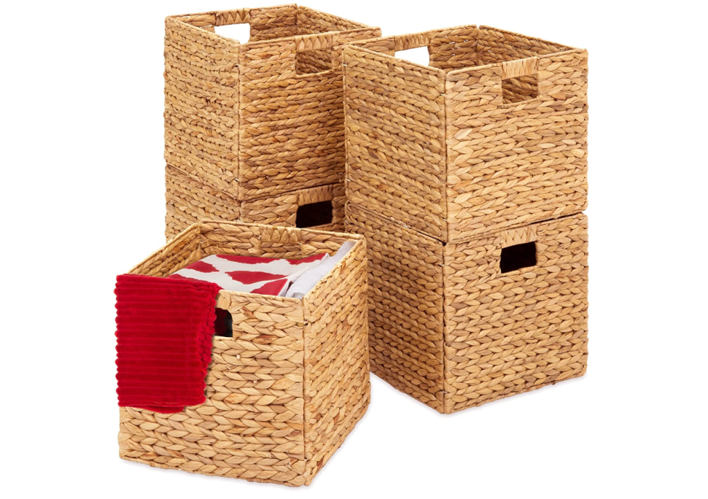 wicker baskets with towels and linens inside