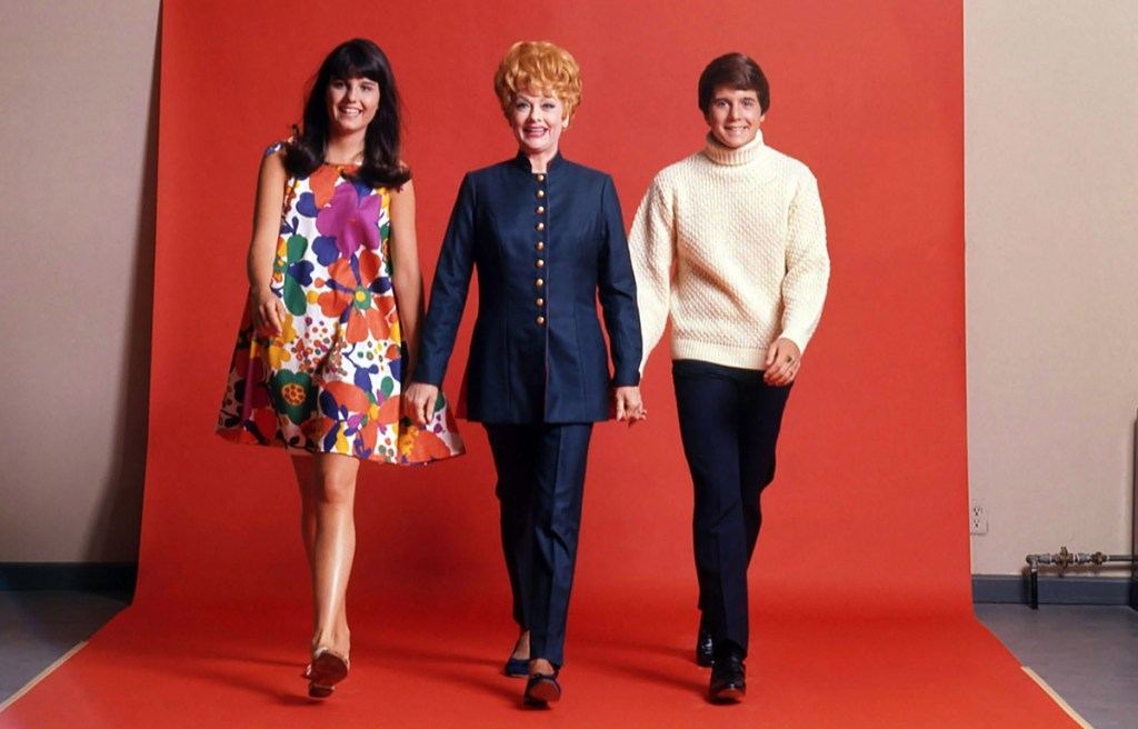 Lucie Arnaz, Lucille Ball and Desi Arnaz Jr in a promotional image for 1968 to 1974's Here's Lucy