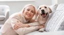 Woman posing with dog