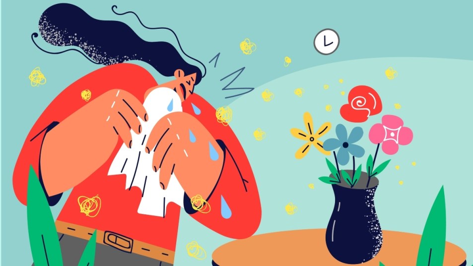 Illustration of woman with dark hair in red sweater sneezing into tissue by a vase of flowers that's releasing pollen. Blue background
