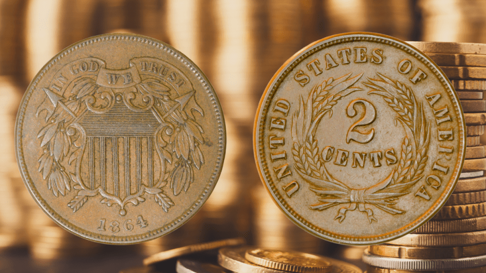 2 cent coin front and back on a background of coins