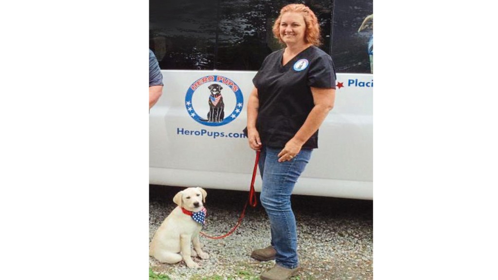 Founder Laura Barker with Haven, future police comfort dog