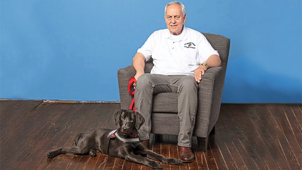 Vietnam Vet and retired State Trooper, Dave Duchesneau with his dog Tucker
